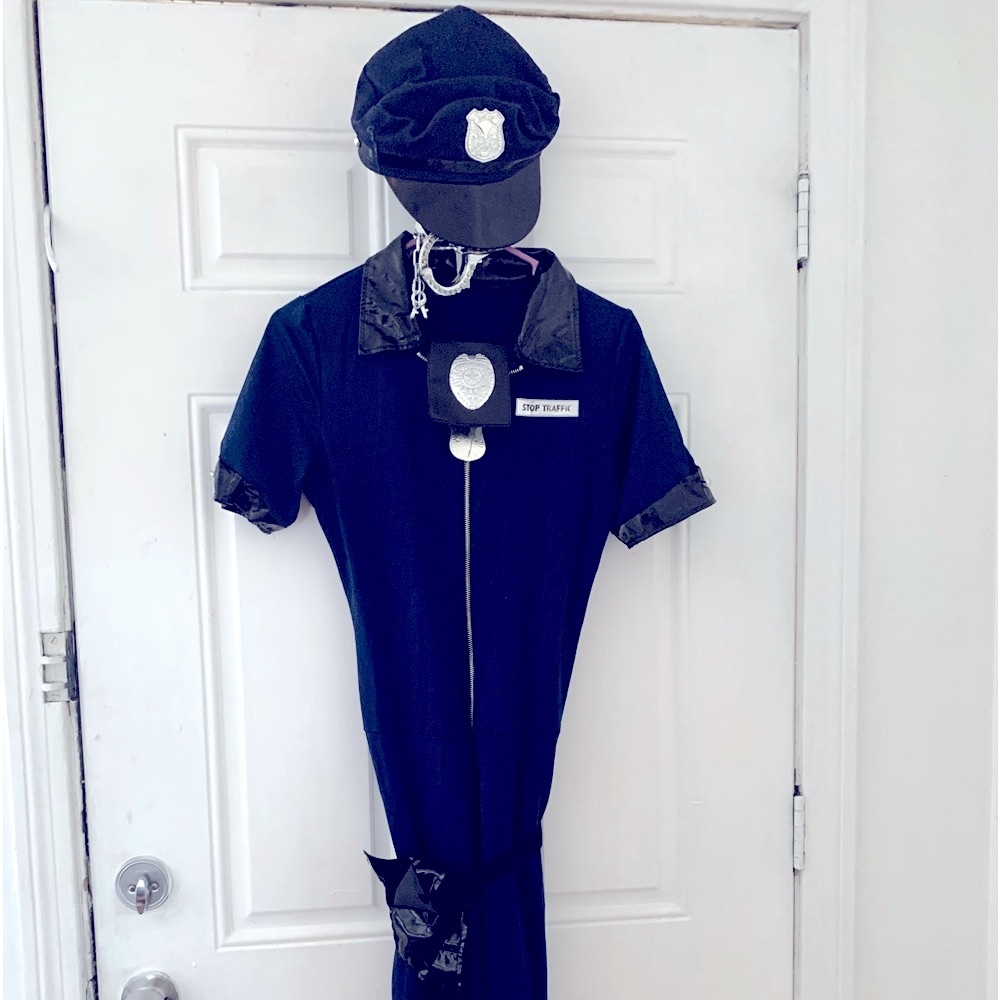 Ladies police costume includes suit belt.badge Cuffs and hat great condition